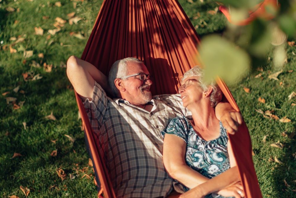 Senior couple relaxing in a hammock 